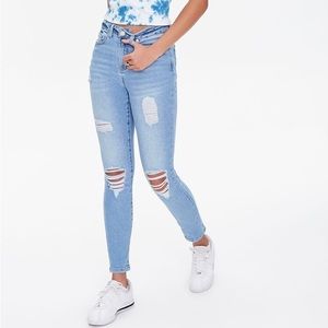 Sustainable Light Wash High-Rise Jeans (size 28). Never worn.